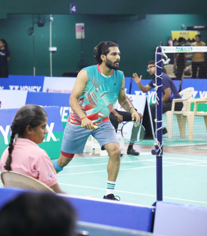 M. Raghu upsets top seed Sathish Kumar to reach men’s singles final of the 86th Senior National Badminton Championship in Bengaluru on Monday. Photo credit: BAI