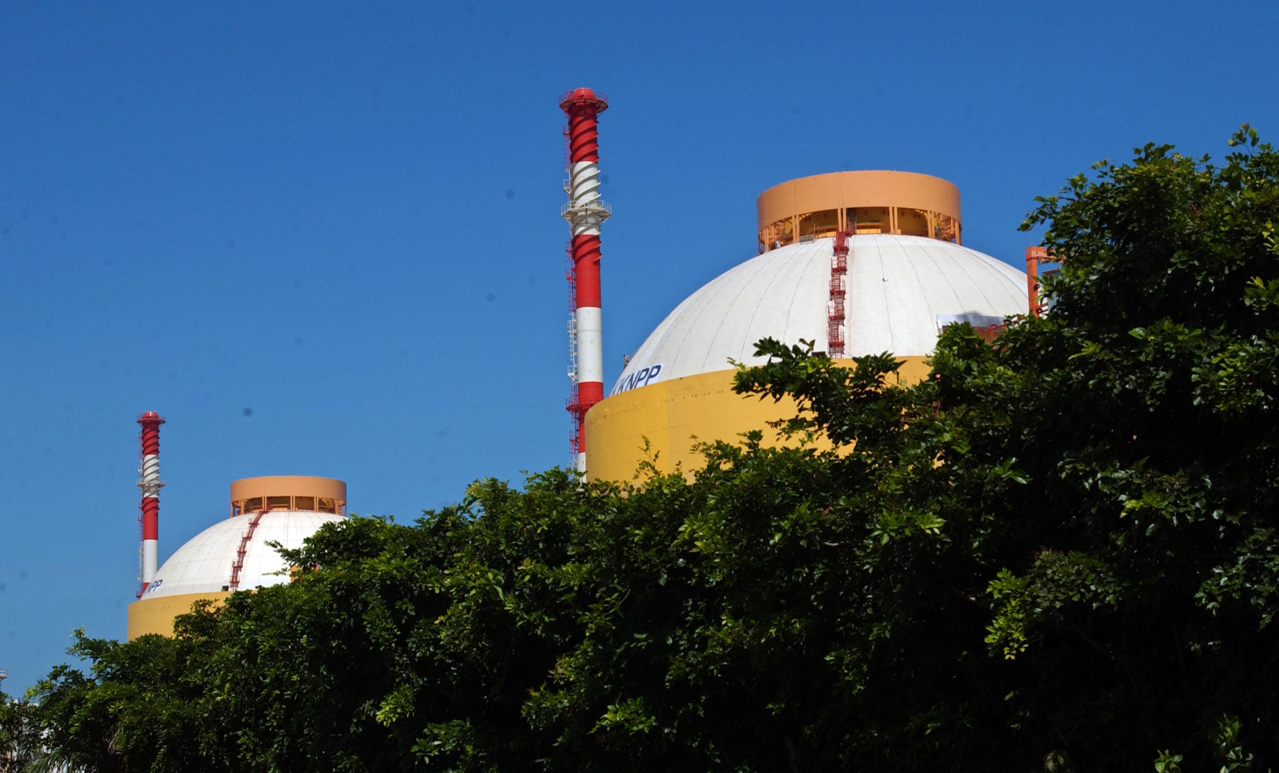 Illustration of nuclear power plant with Indian flag representing SHANTI Bill 2025 impact