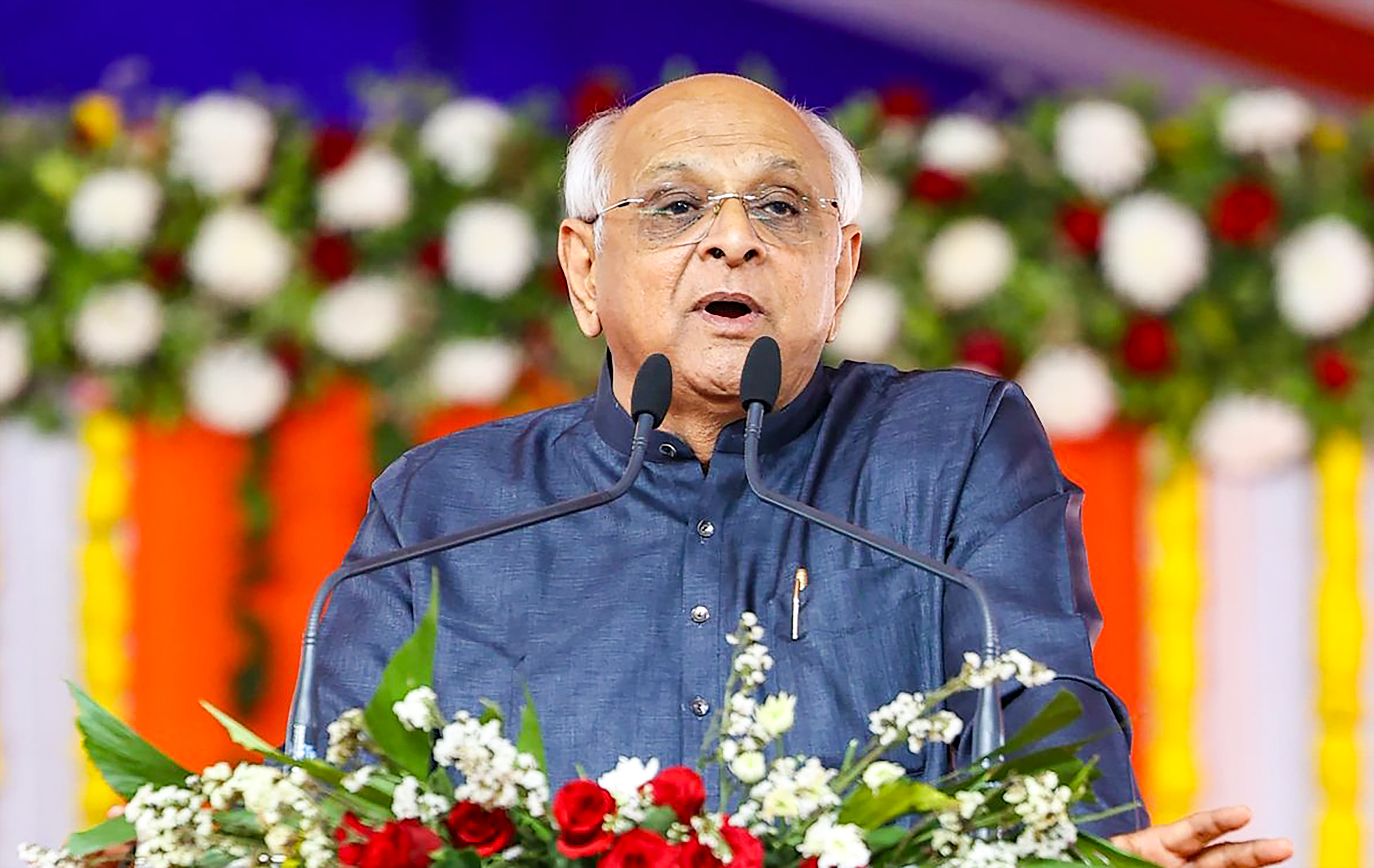 Gujarat Chief Minister Patel speaking at CII conference on  trillion economy goal