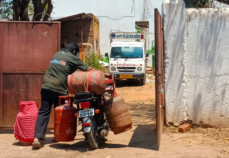 UP government officials conducting inspection at a fuel station