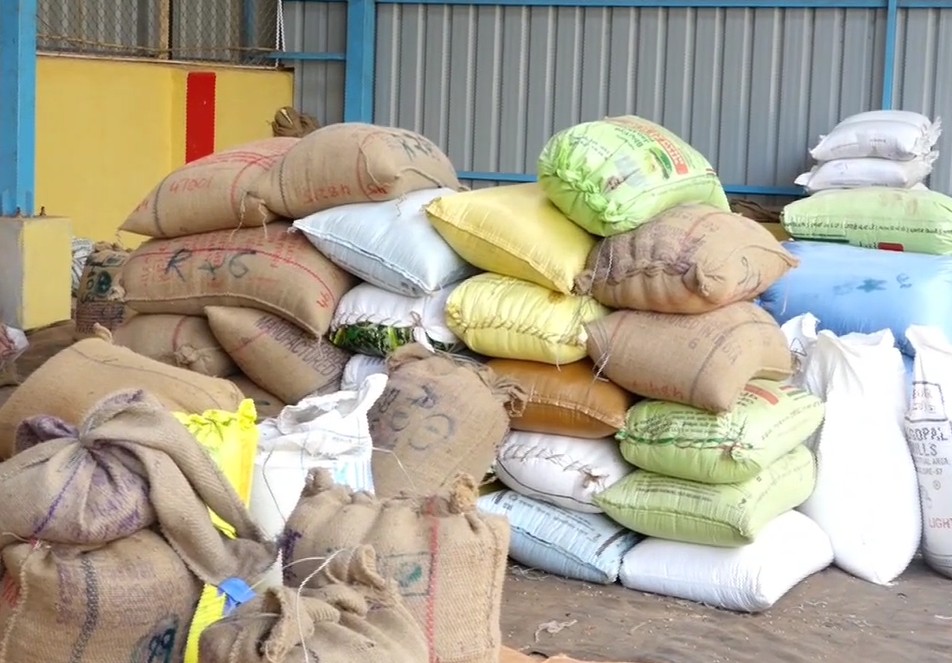 Chickpea sacks piled outside procurement centre in Hubballi