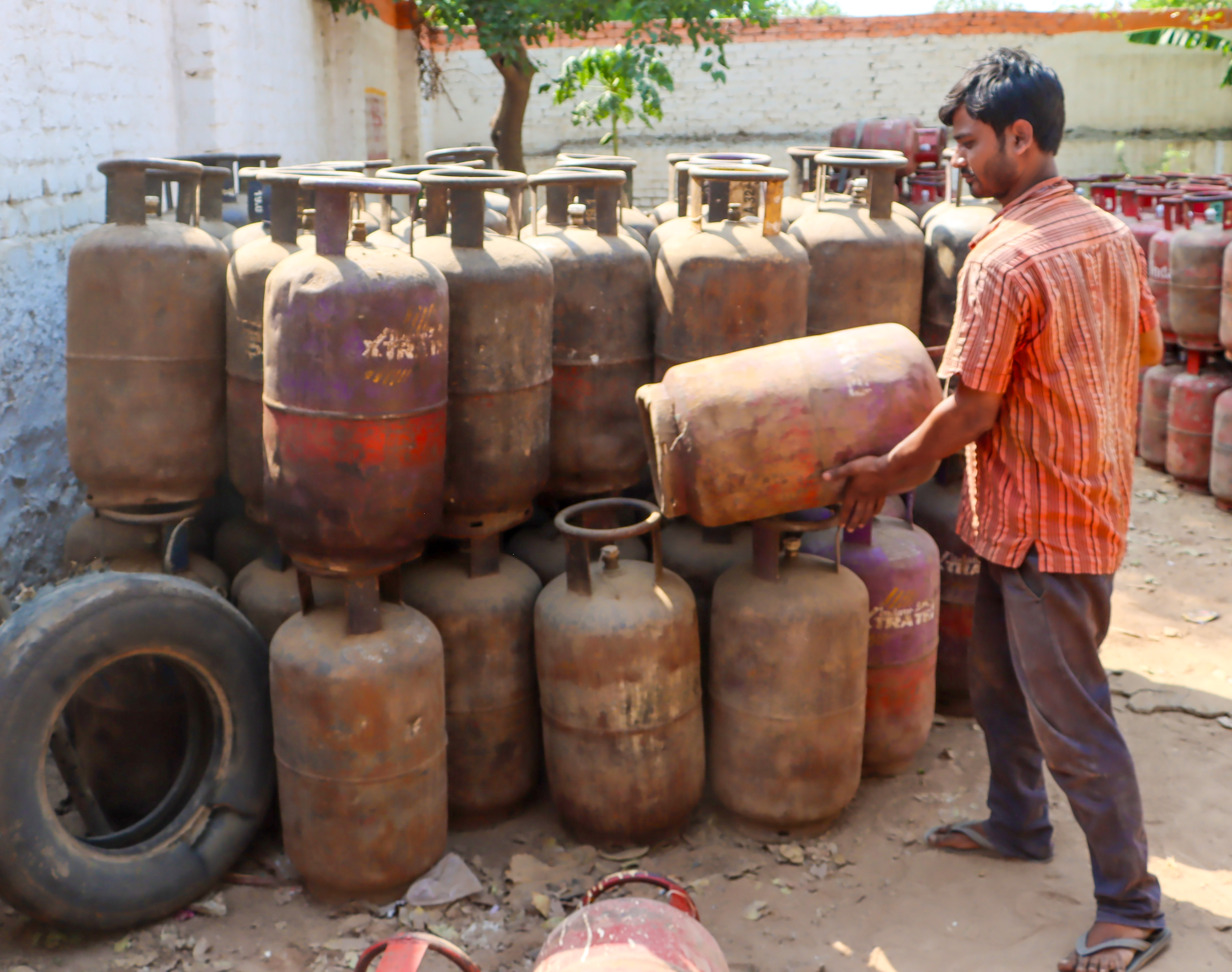 Domestic LPG cylinders being delivered to a home