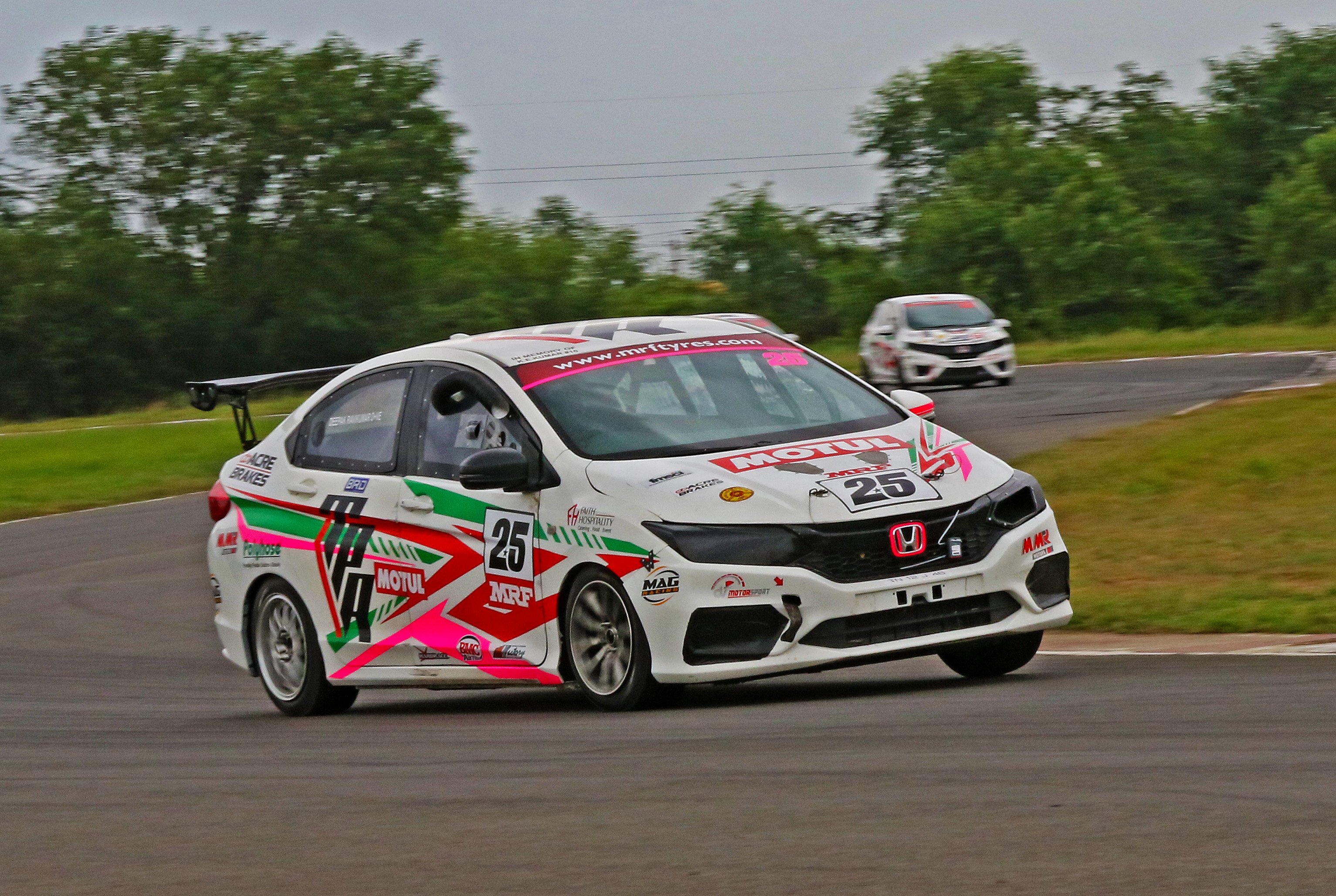 Indian National Car Racing: Deepak Ravikumar, Arjun Balu, Diljith, Tijil Rao win races