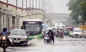 IMD issues rain alert for Delhi as heavy downpour disrupts flights, traffic