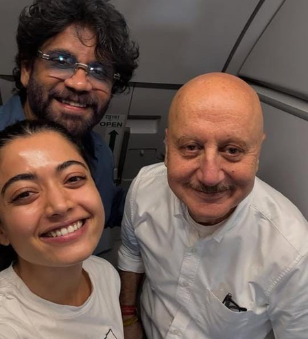Anupam Kher bumps into Rashmika Mandanna & Nagarjuna during his flight to Mumbai Anupam Kher bumps into Rashmika Mandanna & Nagarjuna during his flight to Mumbai