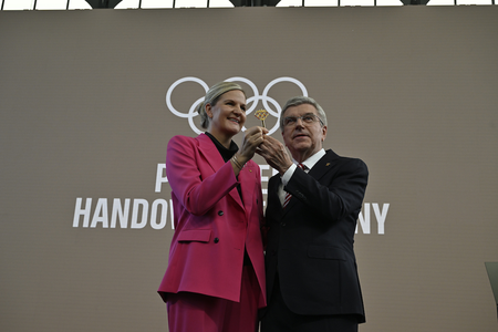 Kristy Coventry takes over as IOC chief, receives golden key from Thomas Bach