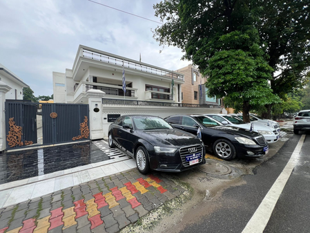 Fake embassy of fictional nations busted in Ghaziabad; Luxury cars, diplomatic gear seized