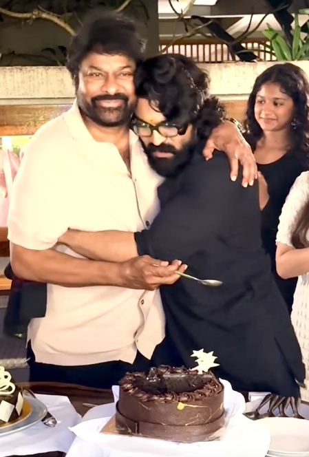 Ram Charan touches Chiranjeevi’s feet while celebrating his 70th birthday Ram Charan touches Chiranjeevi’s feet while celebrating his 70th birthday
