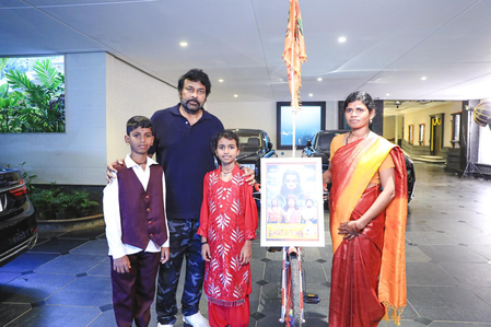Woman fan cycles all the way from Adoni to Hyderabad to meet Chiranjeevi Woman fan cycles all the way from Adoni to Hyderabad to meet Chiranjeevi