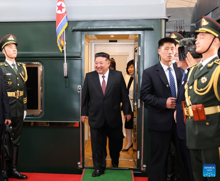 North Korean leader appears to be accompanied by daughter on China visit, says intelligence agency North Korean leader appears to be accompanied by daughter on China visit, says intelligence agency