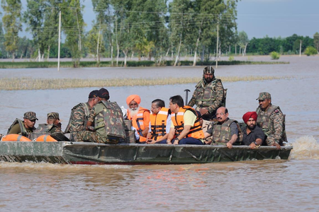 We are standing with you, Kejriwal assures Punjab's flood-hit villagers We are standing with you, Kejriwal assures Punjab's flood-hit villagers