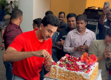 Ranbir Kapoor celebrates his 43rd birthday with the media by cutting a massive cake