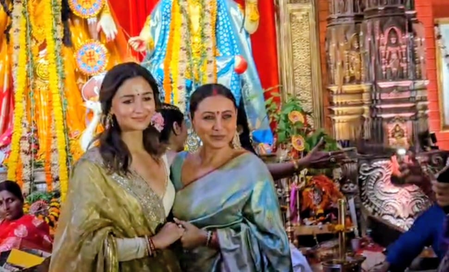 Alia Bhatt looks resplendent in golden saree as she joins Rani Mukerji for Durga Puja
