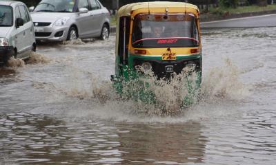 (030914) Gurgaon: Flooded road